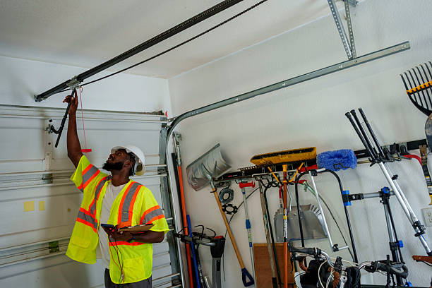 Professional Garage Door Panel Replacement technician working in Ness City, KS