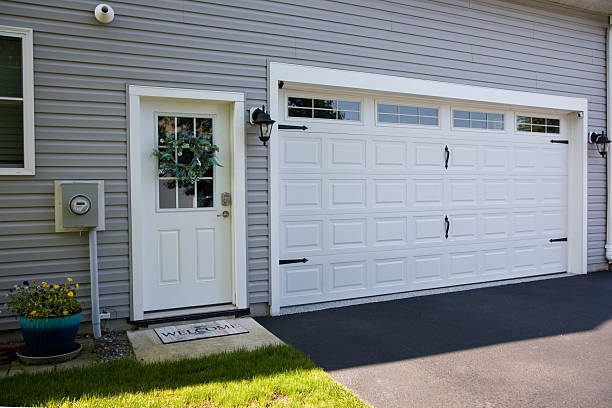 24/7 Emergency Garage Door Panel Replacement experts in Ness City, KS